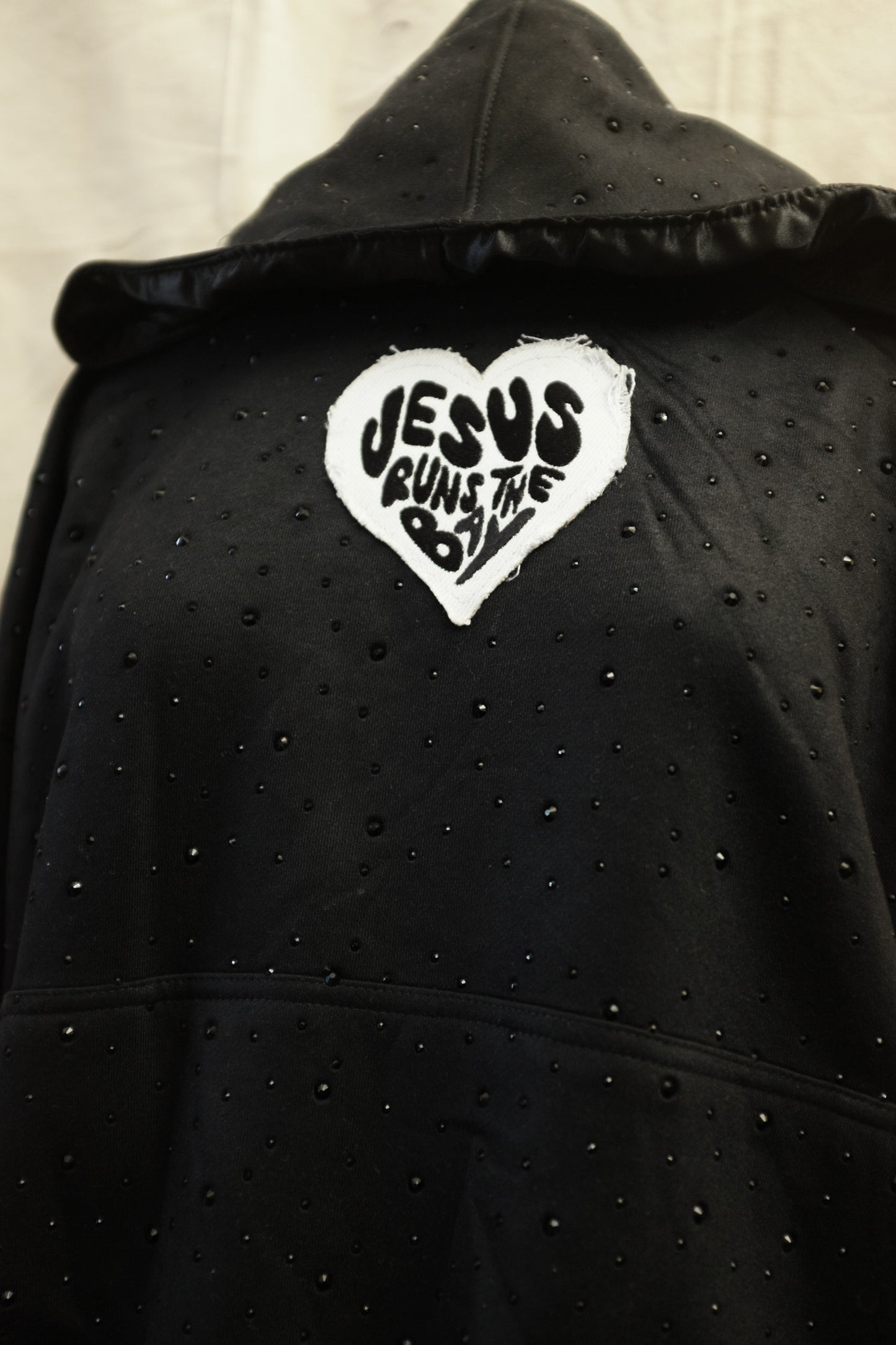 “Jesus Runs The Bay” Oversized Rhinestone Hoodie